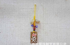 海南特色生肖椰雕手機掛飾廠家直銷批發