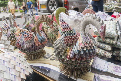 當(dāng)貨幣失范 委內(nèi)瑞拉的鈔票工藝品與生存經(jīng)濟(jì)學(xué)